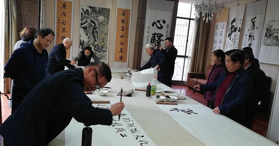 省委统战部组织离退休老同志开展"翰墨丹青颂祖国"书法交流活动